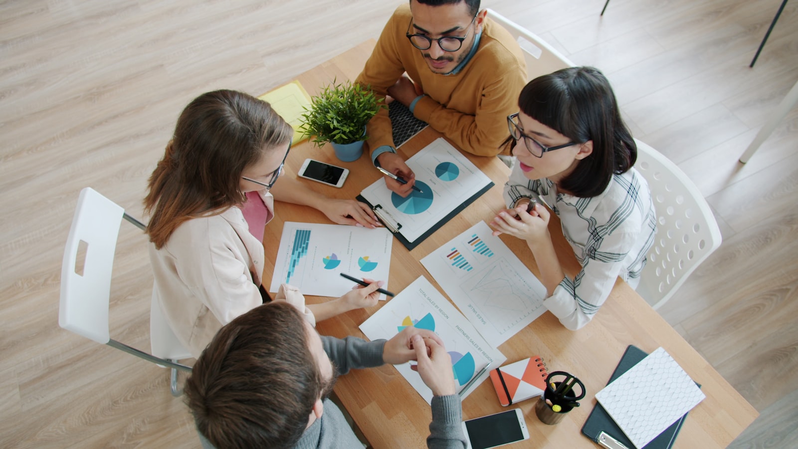 Team reviewing map layers in a planning meeting
